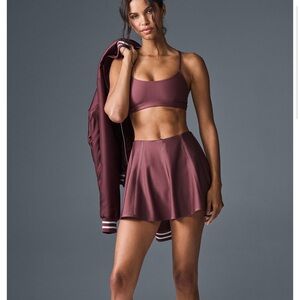 Alo new never worn with tags skirt, color looks like color on model.